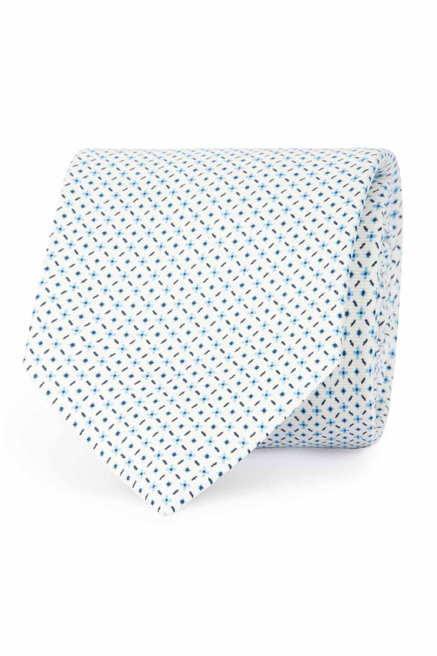 Cravatta stampata bianca con micro design blu 